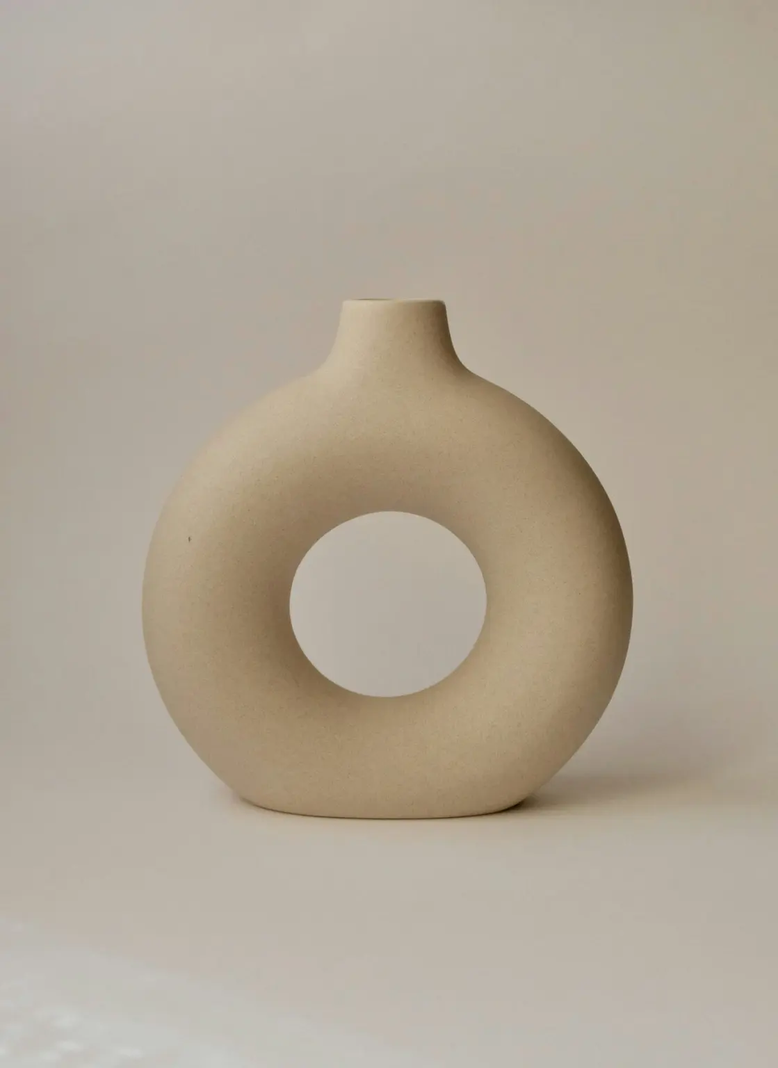Ring-shaped stoneware vase